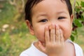 Asian child laughing gag. Close up in her eyes. Feeling happiness Royalty Free Stock Photo