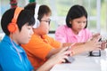 Asian child playing tablet computer together Royalty Free Stock Photo