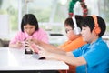 Asian child playing tablet computer together Royalty Free Stock Photo