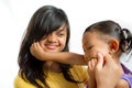 Asian Child Playing Together with Teen Sister Royalty Free Stock Photo