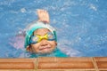 Asian child practice swimming Royalty Free Stock Photo