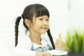 Asian child  Sitting on table and study in school Royalty Free Stock Photo