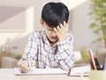 Asian child studying Royalty Free Stock Photo