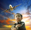 Asian children dreaming to be plane pilot Royalty Free Stock Photo