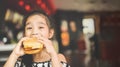 Asian Children eat chicken cheese Hamburger Food Court