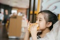 Asian Children eat chicken cheese Hamburger Food Court