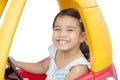 Asian children girl driving toy car yellow Royalty Free Stock Photo