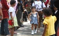 Asian children model wearing batik at fashion show runway