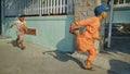Asian children playing and running