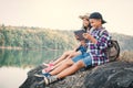 Asian children playing tablet in nature Royalty Free Stock Photo