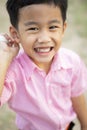 Asian children toothy smiling face happiness emotion Royalty Free Stock Photo