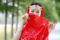 Masked Asian Chinese beauty belly dancer Royalty Free Stock Photo