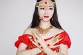 Graceful Asian Chinese belly dancer in White background Royalty Free Stock Photo