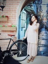 Beautiful sweet Chinese girl in an old alley of shanghai Royalty Free Stock Photo