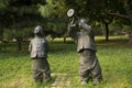 Asian Chinese, Beijing, International Sculpture Park, sculpture,Play the suona, singing folk songs, children