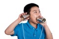 Asian Chinese Boy Playing with Tin Can Phone Royalty Free Stock Photo