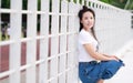 Asian Chinese university student play on the playground Royalty Free Stock Photo