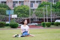 Asian Chinese university student play on the playground Royalty Free Stock Photo