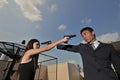 Asian chinese couple trying to kill each other Royalty Free Stock Photo