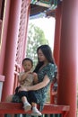 Asian Chinese family go to Beijing, capital of China, visit ancient traditional pavilion in Jingshan Park