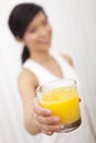 Asian Chinese Girl Holding Glass of Orange Juice Royalty Free Stock Photo