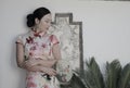 Asian Chinese girls wears cheongsam enjoy free time in ancient town Royalty Free Stock Photo