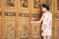 Asian Chinese girls wears cheongsam enjoy free time in ancient town Royalty Free Stock Photo