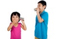 Asian Chinese Kid Playing with Tin Can Phone Royalty Free Stock Photo