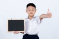 Asian Chinese Little Boy Wearing Student Uniform Holding Chalkboard Royalty Free Stock Photo