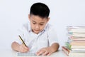 Asian Chinese Little Boy Wearing Student Uniform Writting Homework Royalty Free Stock Photo