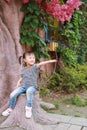 Little cute lovely girl Chinese child smile laugh play and have fun at summer park nature happiness childhood Royalty Free Stock Photo