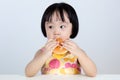 Asian Chinese little girl Eating Burger Royalty Free Stock Photo