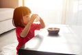 Asian Chinese little girl having breakfast with milk Royalty Free Stock Photo