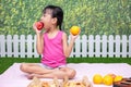 Asian Chinese little girl having picnic Royalty Free Stock Photo