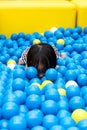 Asian Chinese Little Girl Hiding At Balls Pool