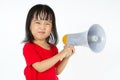 Asian Chinese little girl holding megaphone Royalty Free Stock Photo