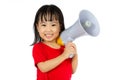 Asian Chinese little girl holding megaphone Royalty Free Stock Photo