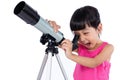 Asian Chinese little girl holding a telescope Royalty Free Stock Photo