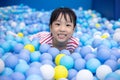 Asian Chinese little Girl Playing At Balls Pool Royalty Free Stock Photo