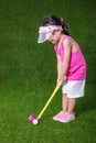 Asian Chinese little girl playing golf Royalty Free Stock Photo