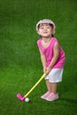 Asian Chinese little girl playing golf Royalty Free Stock Photo