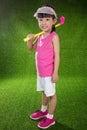 Asian Chinese little girl playing golf Royalty Free Stock Photo