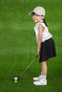 Asian Chinese little girl playing golf Royalty Free Stock Photo