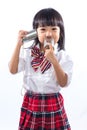 Asian Chinese little girl playing retro tin can phone Royalty Free Stock Photo