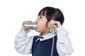 Asian Chinese little girl playing retro tin can phone