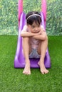 Asian Chinese Little Girl Playing on the slide Royalty Free Stock Photo