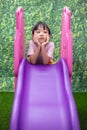 Asian Chinese Little Girl Playing on the slide Royalty Free Stock Photo