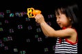 Asian Chinese Little Girl Playing Soap Bubbles Royalty Free Stock Photo