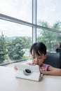 Asian Chinese little girl playing tablet computer Royalty Free Stock Photo