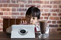 Asian Chinese little girl playing tablet computer Royalty Free Stock Photo